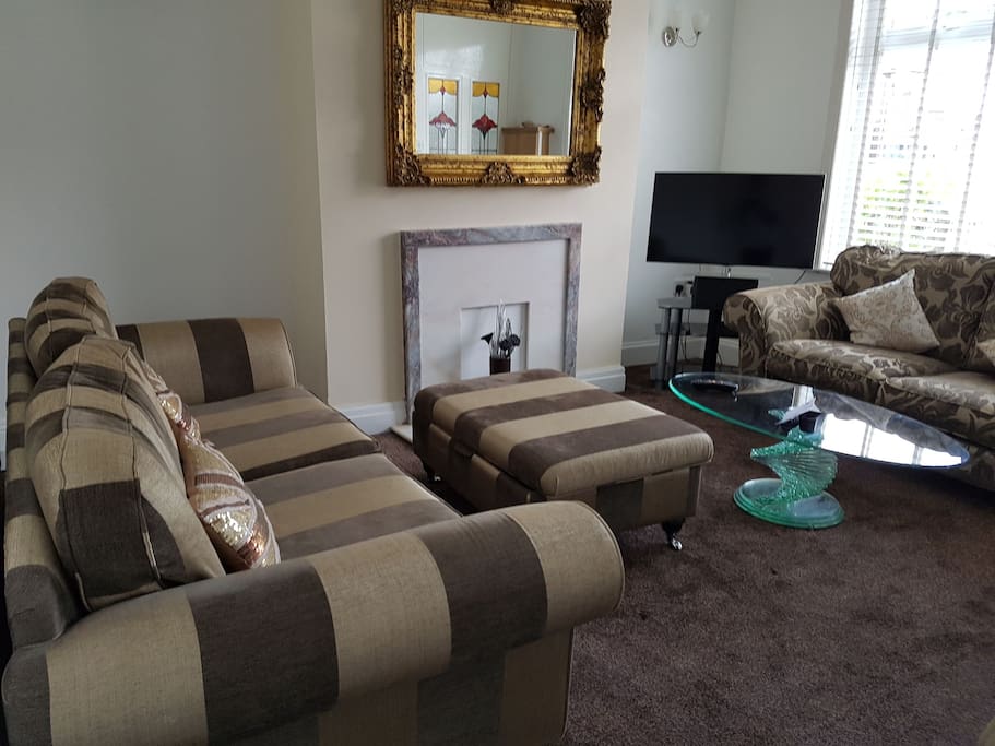 Reception room with 3, 2 and 1 seater sofa. 40" Led Samsung tv, Netflix and virgin media.