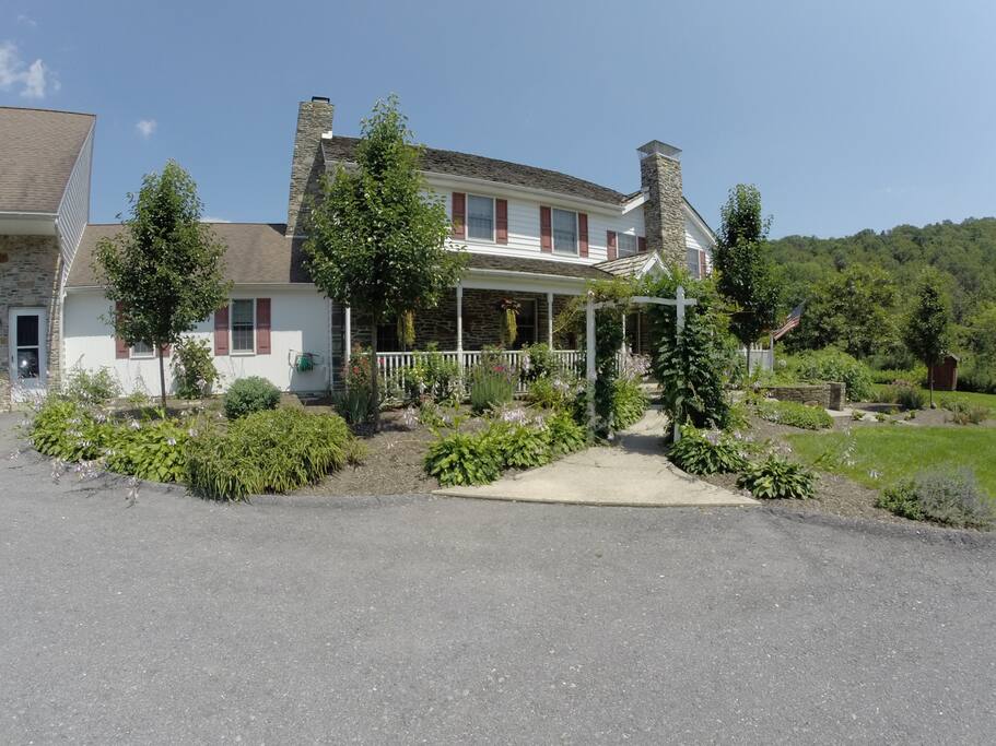 Photo of the front exterior during summer.