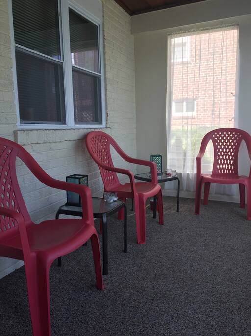 Welcoming Front porch closed in seating area.
