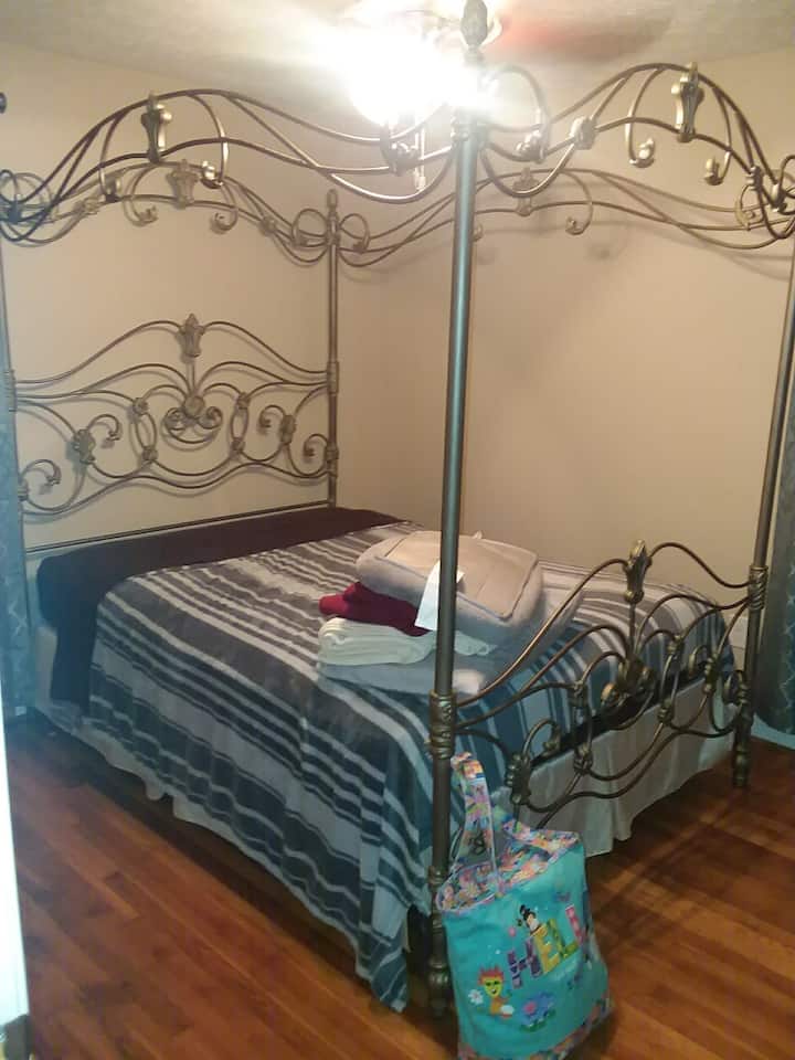 Master bedroom with queen bed