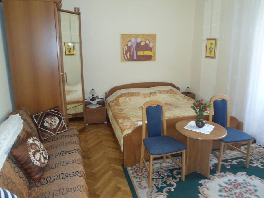 Room with double bed + sofa