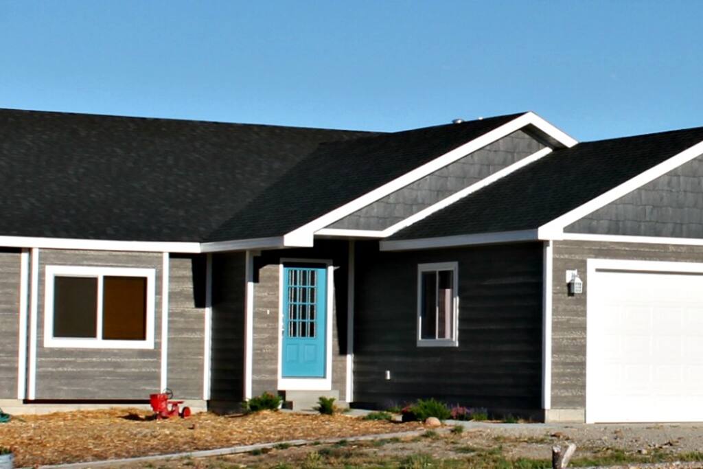 The house with the cute blue door.