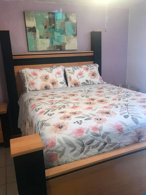 Queen bed with high quality bedding