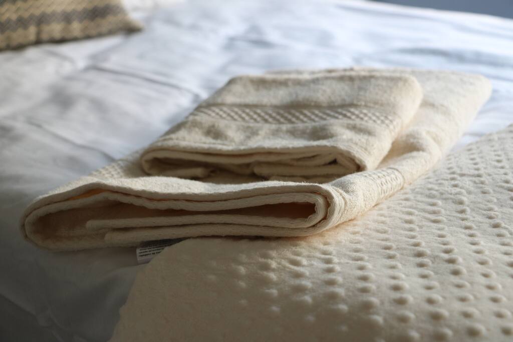 Towels and linens are provided.