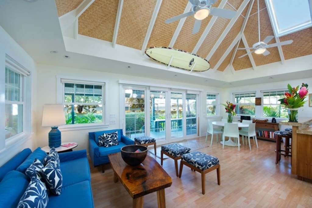 Living room that looks outside to the beach/surf