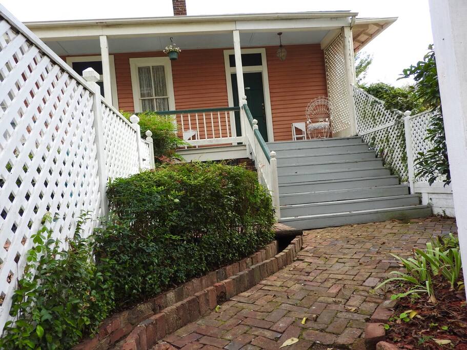 Brick pathways lead you to the 1880s house