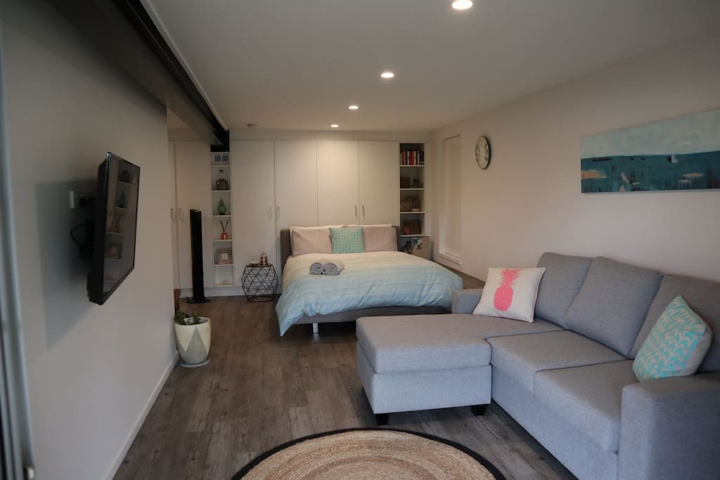 queen sized pull out innerspring pillow top in the lounge