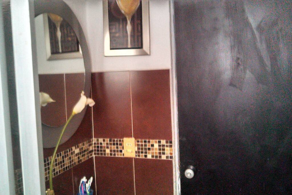 baño compartido