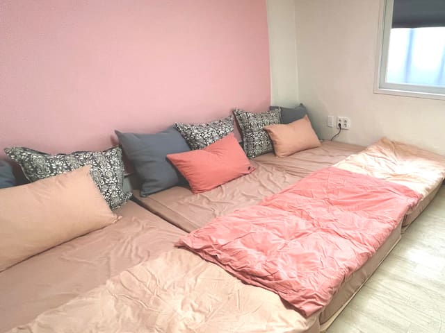 Room A three super single size beds 