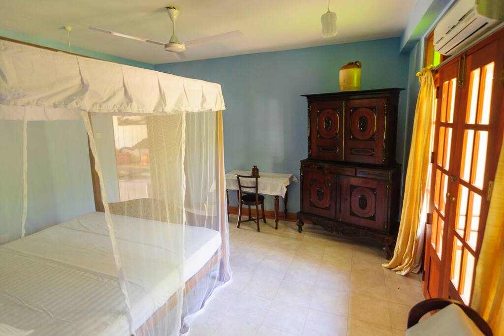 bedroom with AC and ensuite bathroom