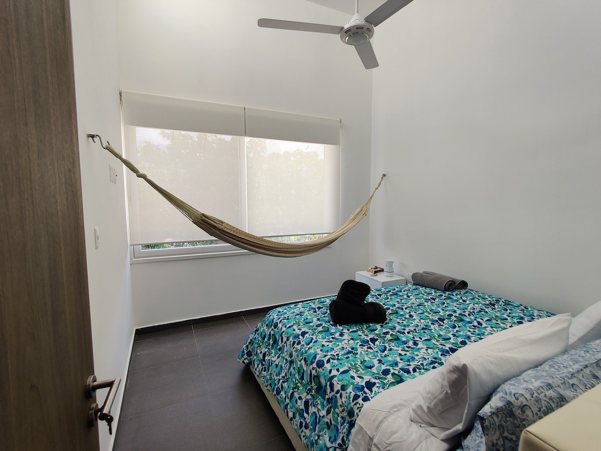 2 bedroom with king bed, hamock, A/c, ceiling fan,  walk-in closet and bathroom