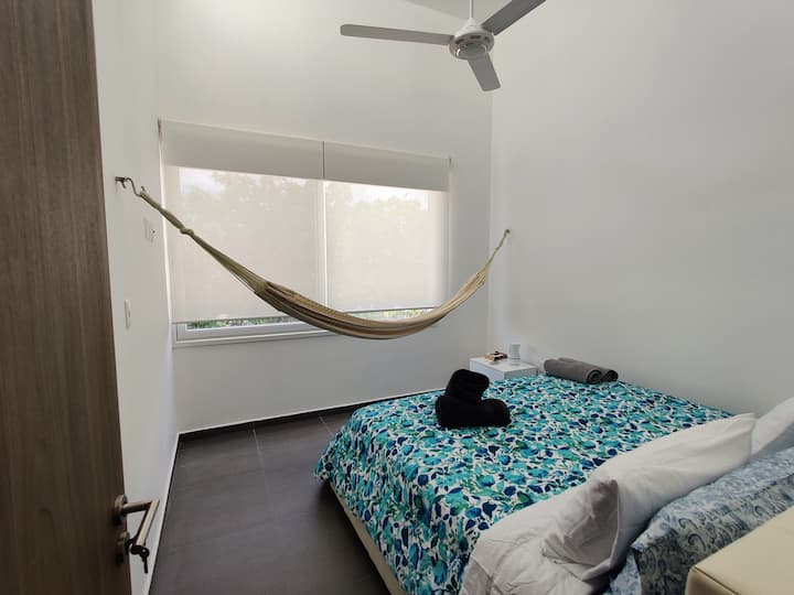 2 bedroom with king bed, hamock, A/c, ceiling fan,  walk-in closet and bathroom