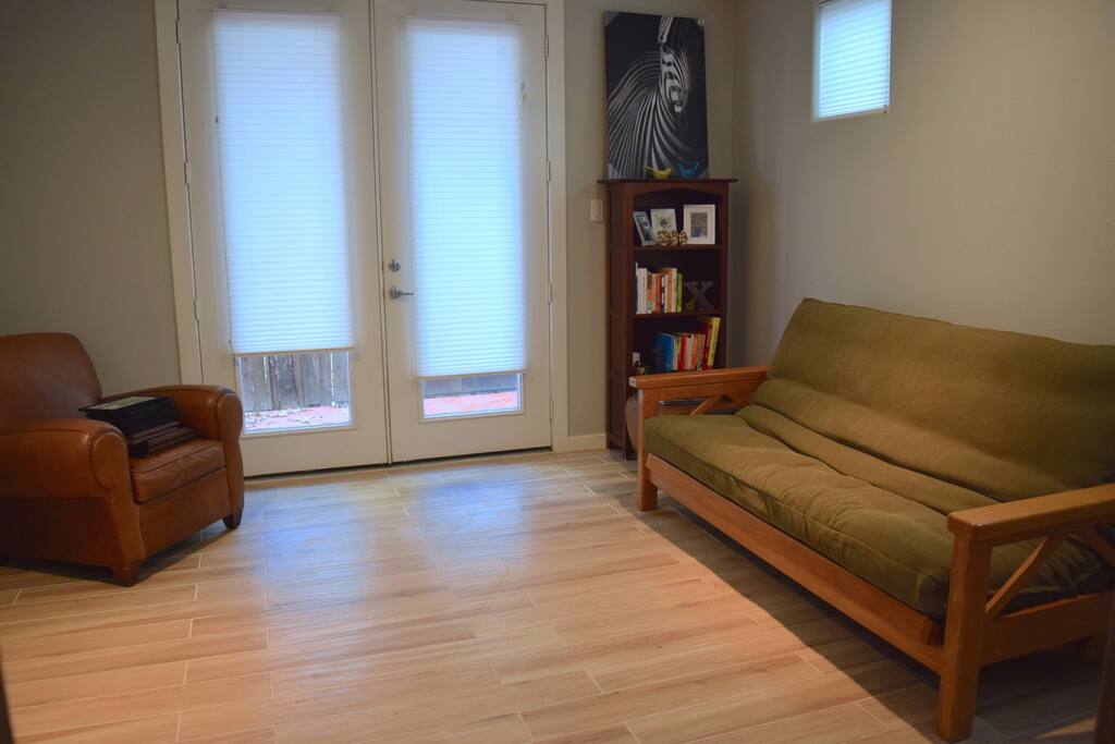 First floor study with full bath, computer desk and exit to patio