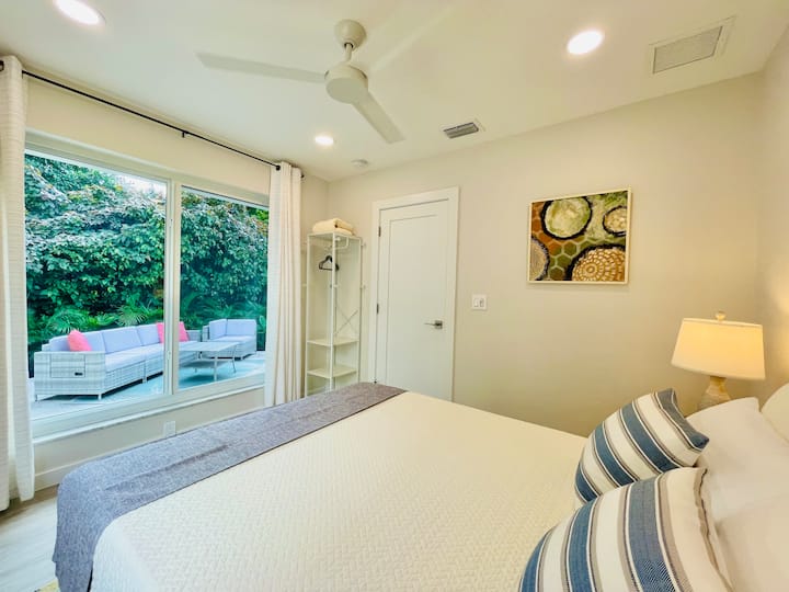 Bedroom #4, Queen size bed, ceiling fan, relaxing back patio view
