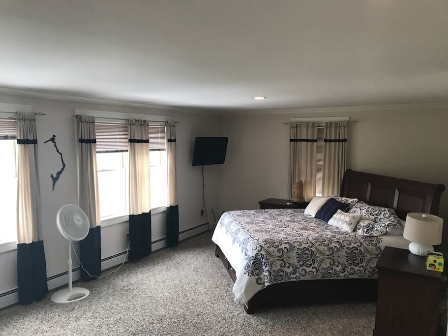 Master Bedroom with King Size bed, plenty of closet space and breathtaking views of the water.