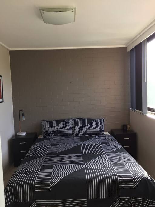 Queen room with double glazed windows.