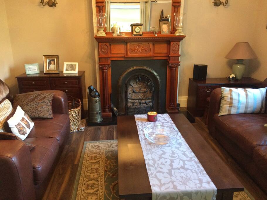Living room with open fireplace