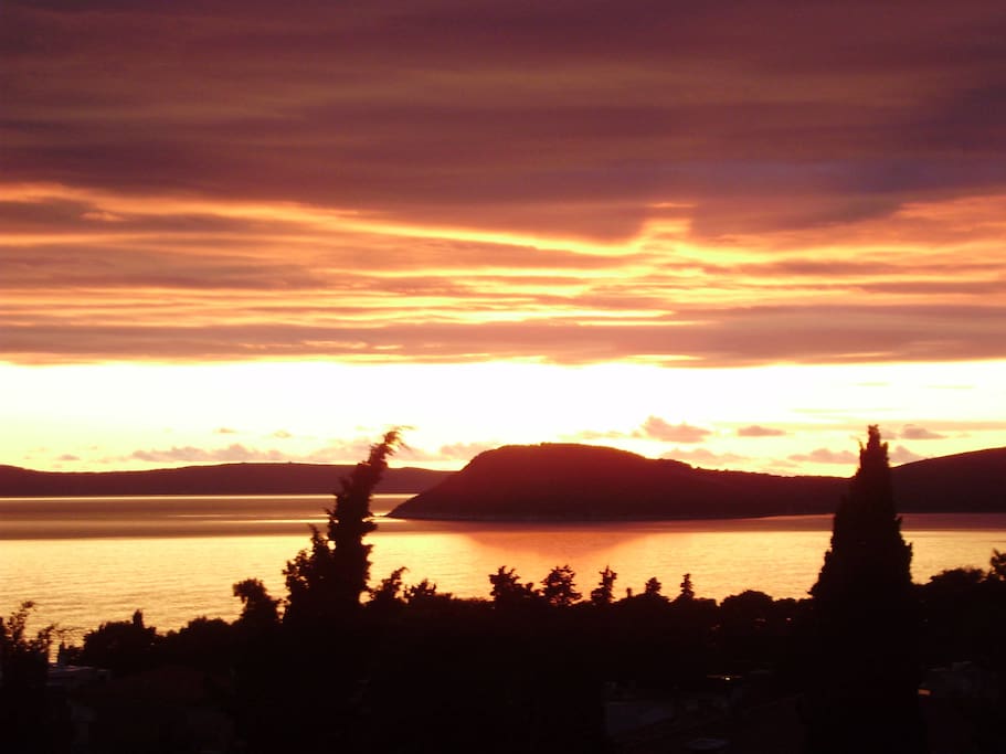 Magical view of the sunset over peninsula of Čiovo from the terrace