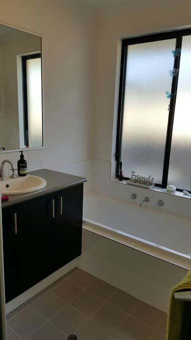 bathroom with large seperate shower and bath.