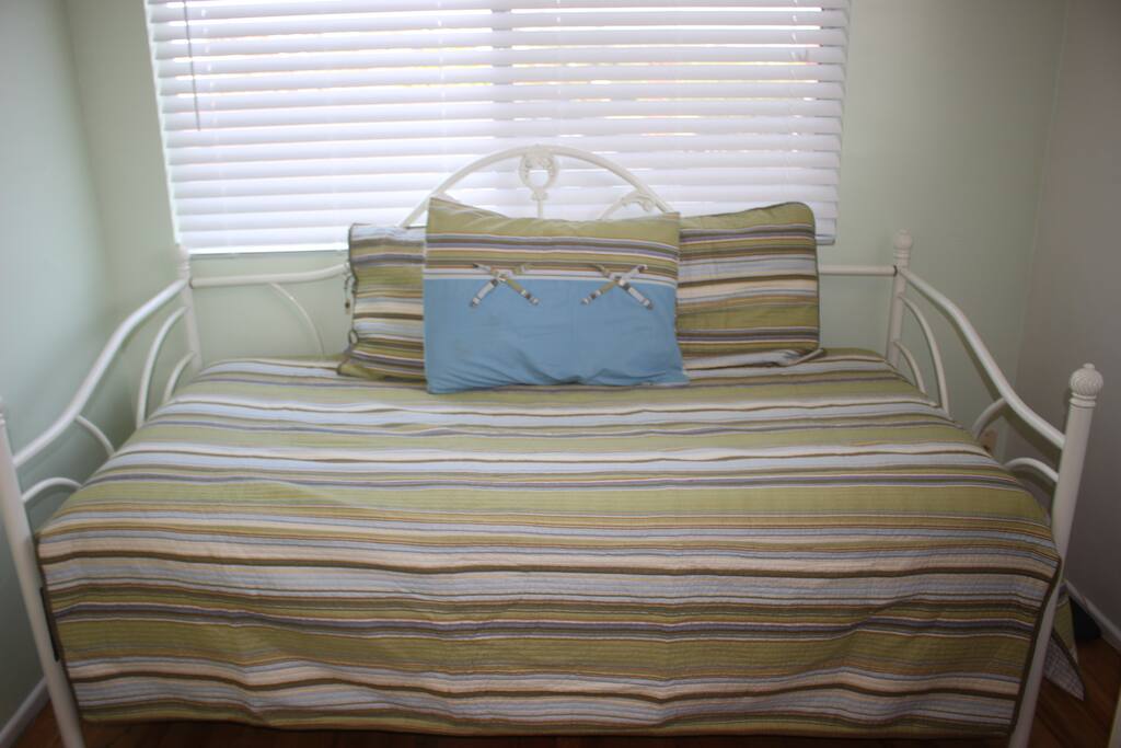 This comfy daybed is perfect for one person...and it is very quiet at night so you can get a good night's sleep after a day at the beach!