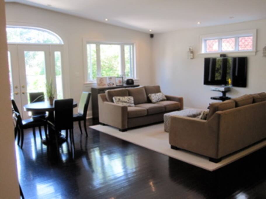 Great room. Perfect for entertaining -- 55" TV lots of seating.