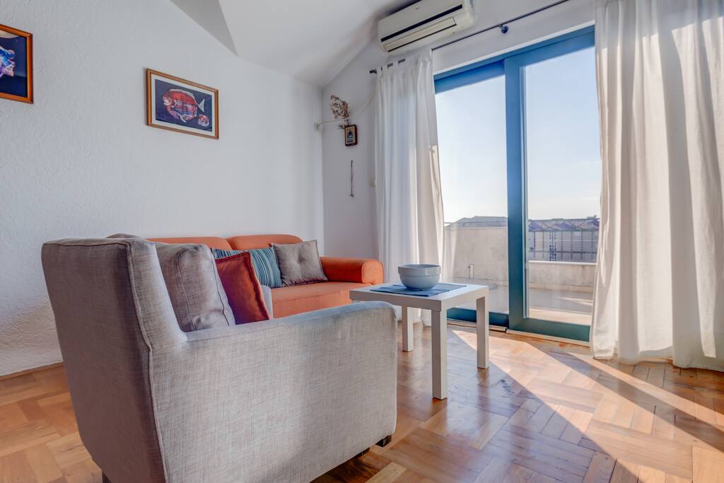 If you prefer to enjoy the view and light, you can use comfortable armchair or sofa.