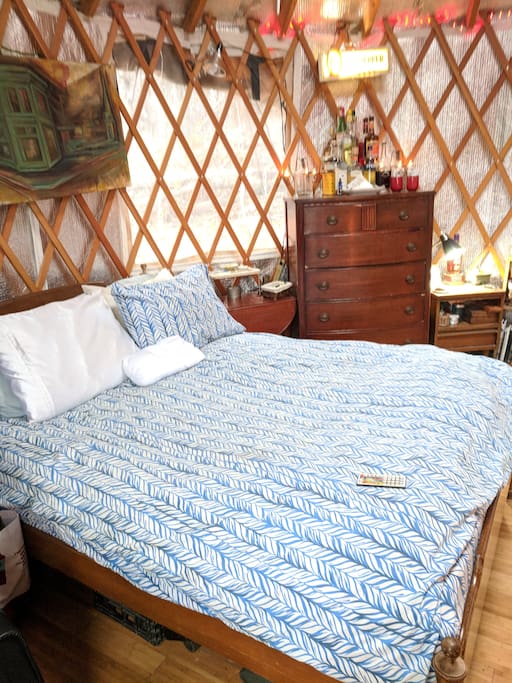 A queen size bed and down comforters provide sound rest for our weary travelers. (poly available for those allergic).