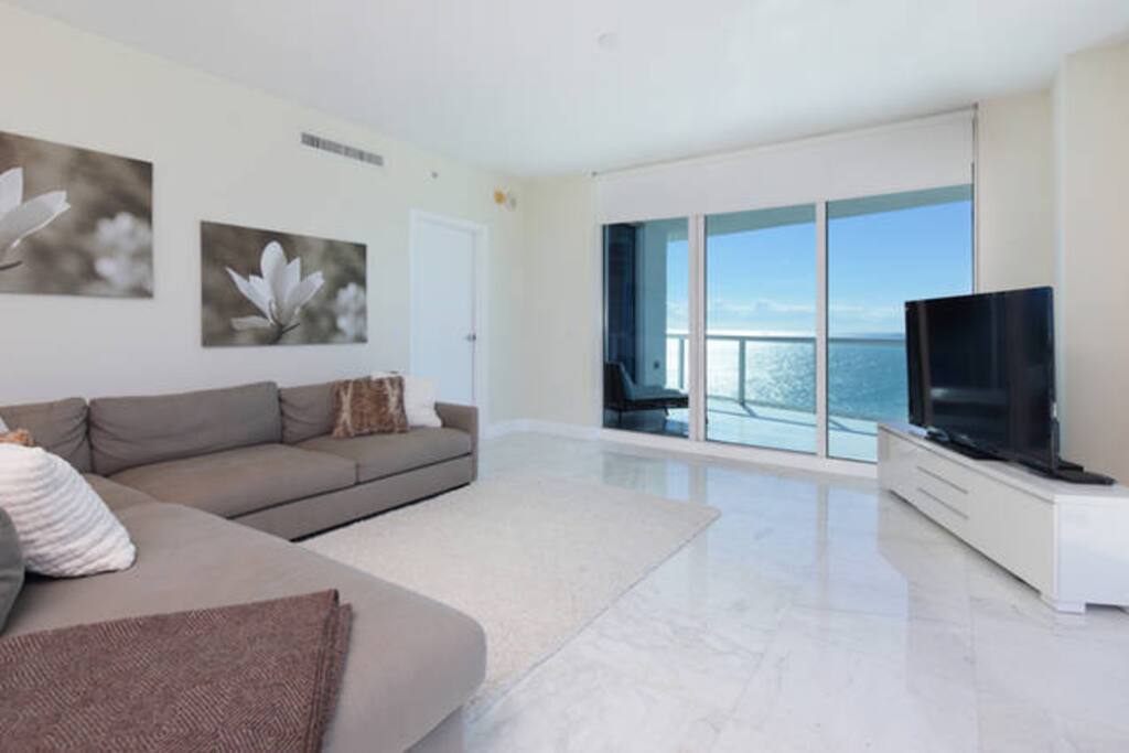 Great room with Calcutta Gold marble