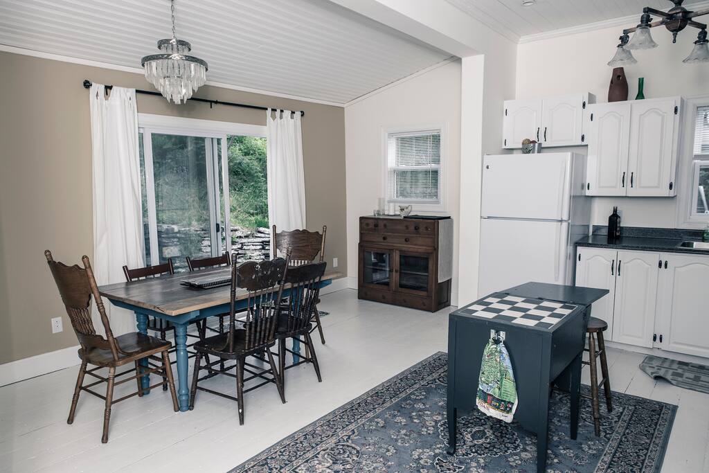 Large and fully equipped kitchen with patio doors to very private backdeck