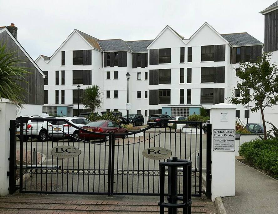 Private gated entrance to the apartment with private parking