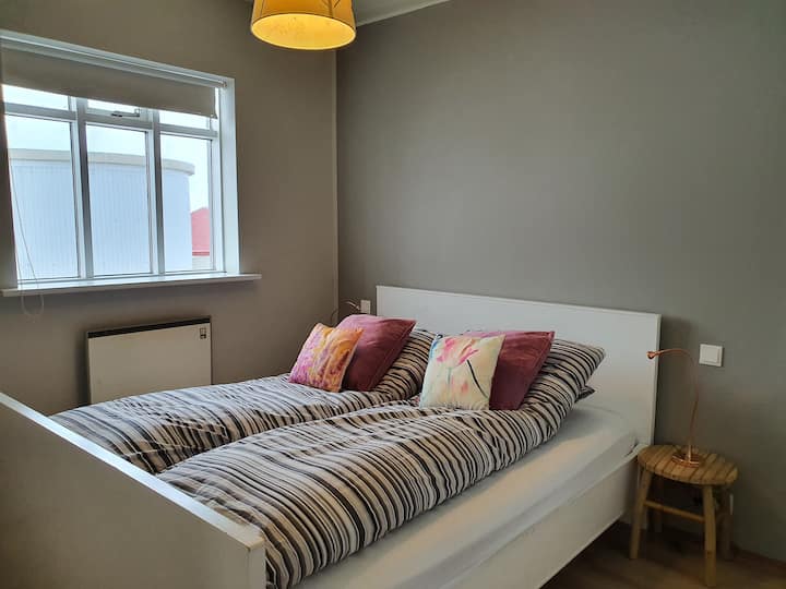 Bedroom on the ground floor with one double bed, the room has closets and hangers, double USB ports by both bedsides