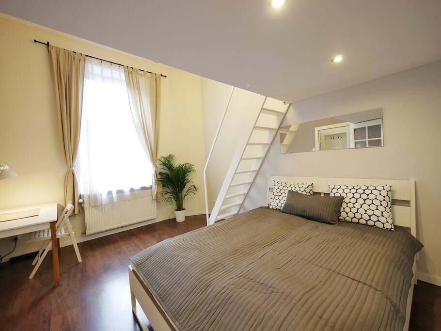 Bedroom is also very bright. I think that desk is super useful furniture :)