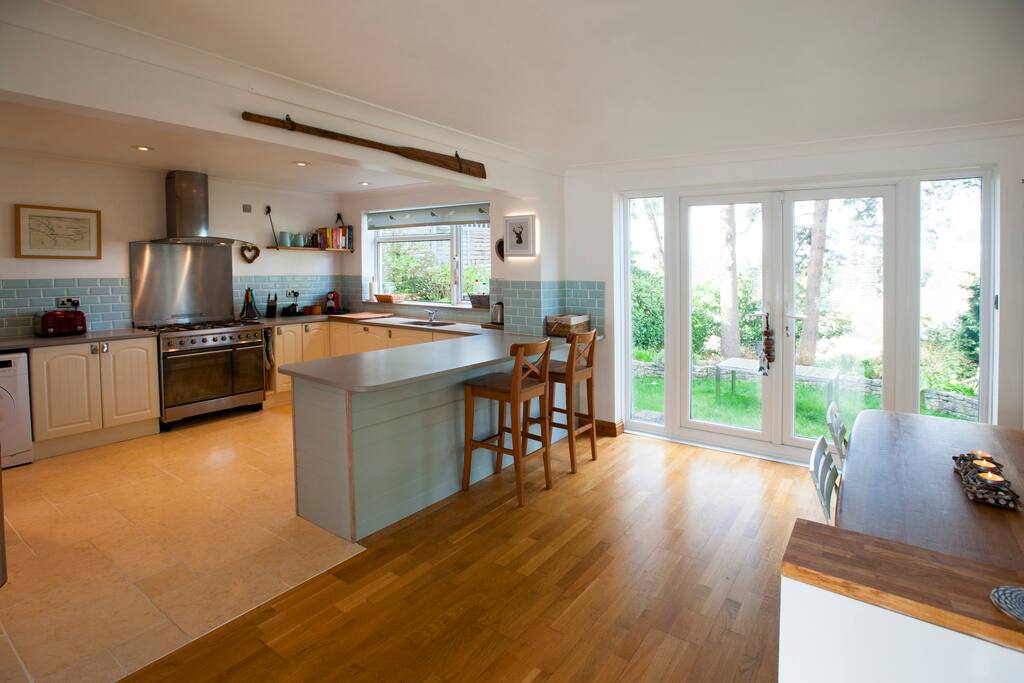 Kitchen/dining room with french doors leading to the patio/garden.