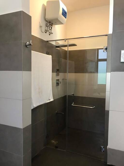 Master bedroom with electronic shower