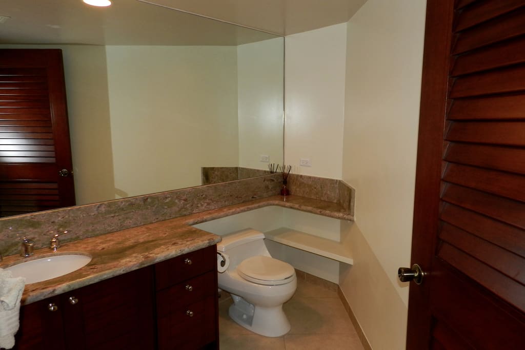 Convenient powder room off from living area.