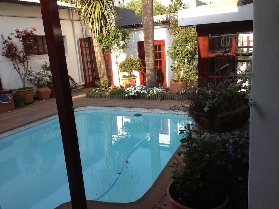 The backyard includes a lovely recreation area with 'braai' (barbecue) facilities for guests to enjoy