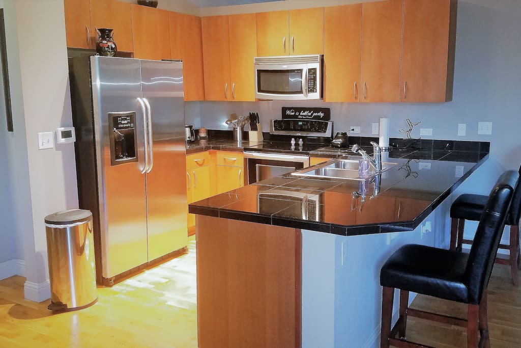 Fully Stocked, Open & Spacious Kitchen