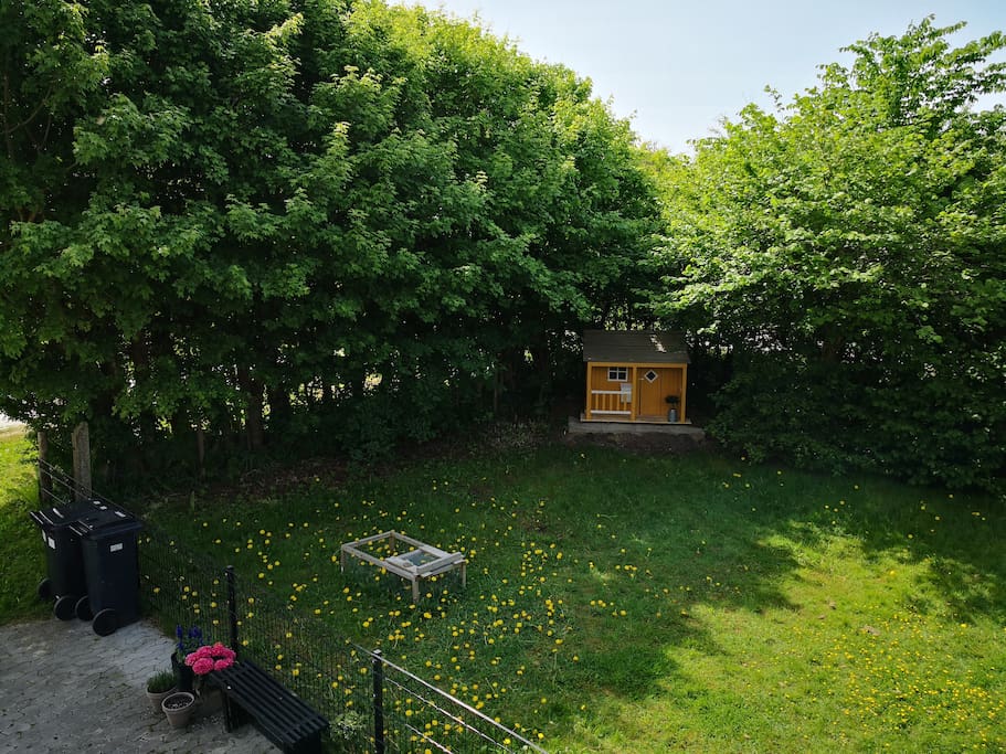 There's room for playing in the small garden and in the little play house