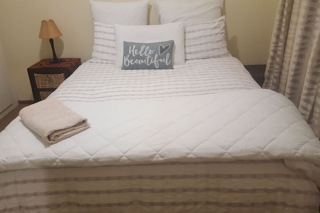 private bedroom with queen bed