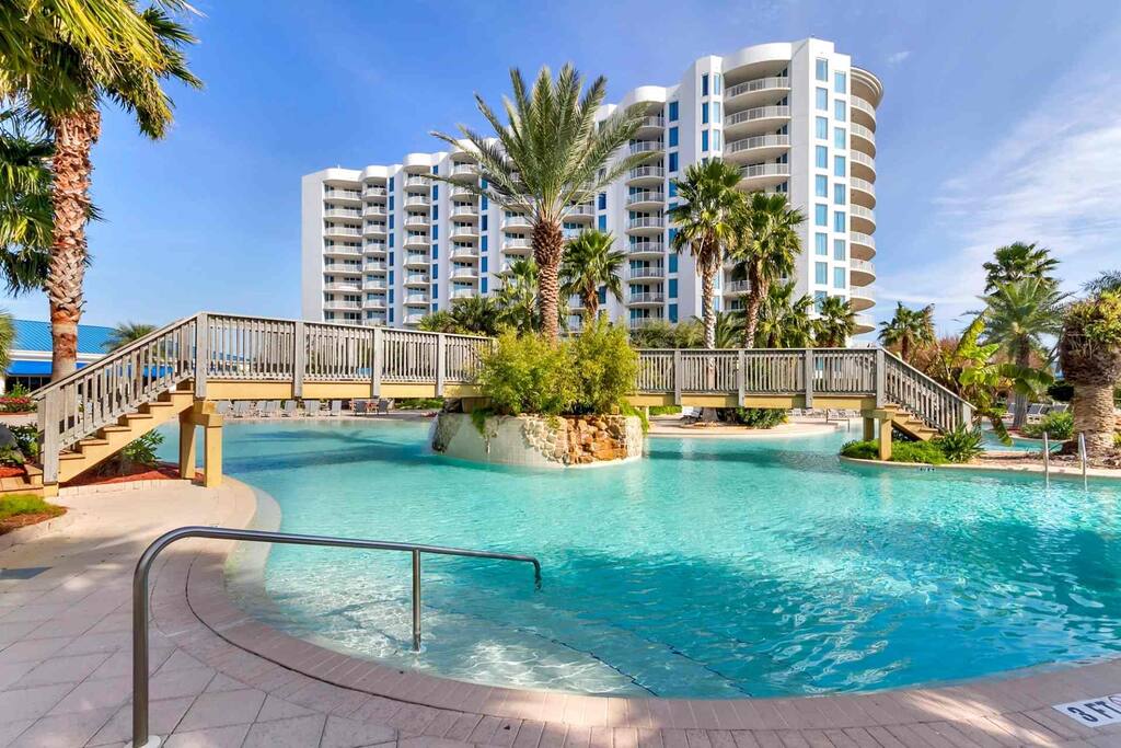 Destin's Premier resort with its lush tropical landscape surrounding its lagoon pool
