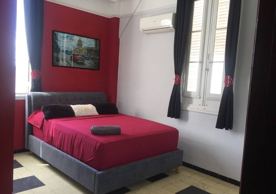 Bedroom with Queen size bed and comfortable mattress, from the windows an spectacular view of the city and the sea.