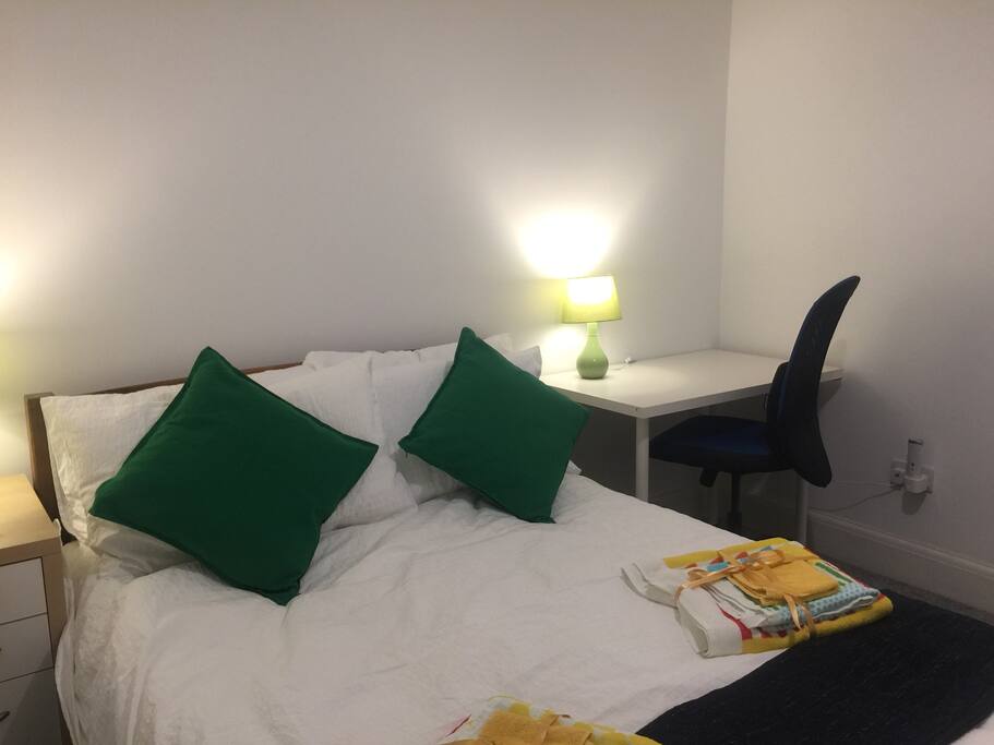comfy bed with memory foam mattress topper and cotton towels