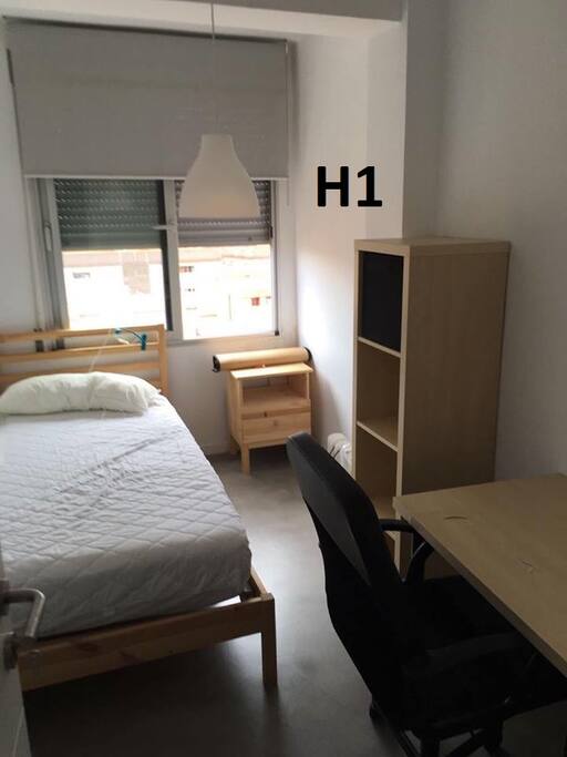 single room with closet and desk