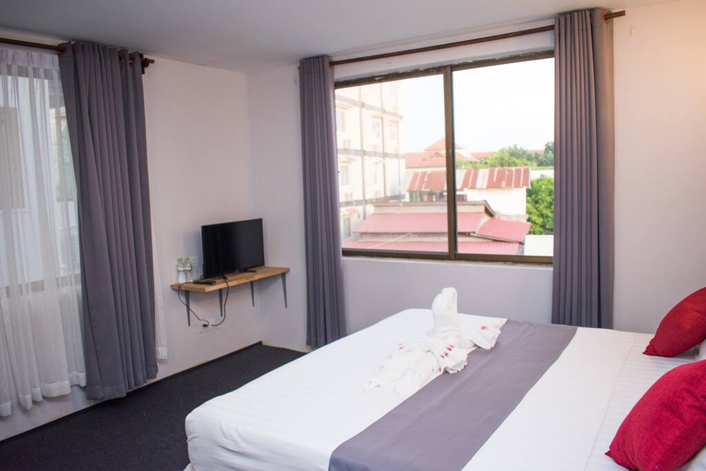 Comfy bed with city view