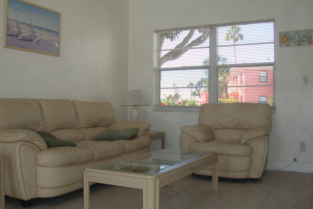 Living room comfy seating with flat screen TV and wifi