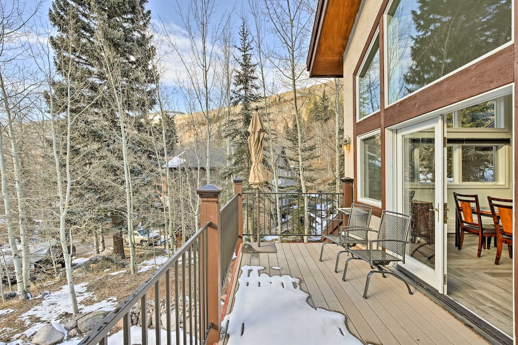 Take in the mountain views from the front porch of this Vail vacation rental.
