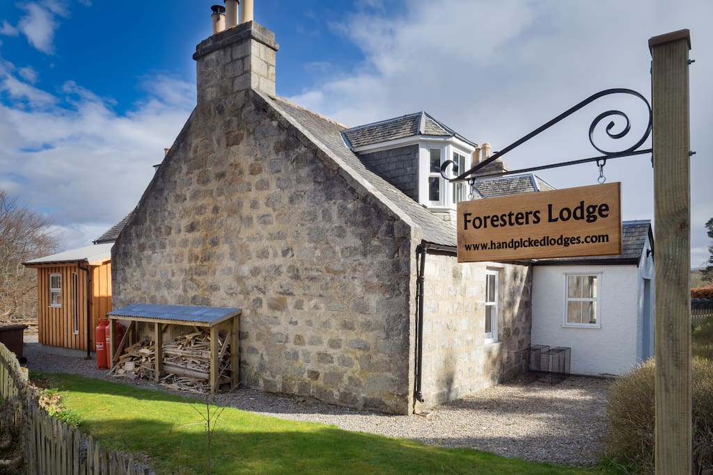 Look out for this sign, when you see it turn left where you will find plenty parking at the back of the house.