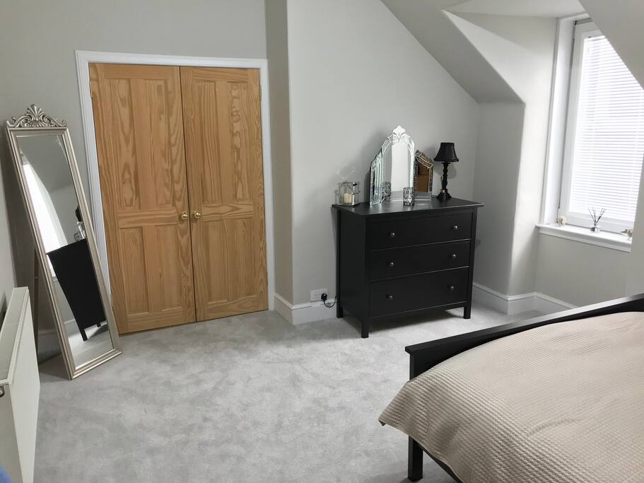 Bedroom storage and wardrobe with hangers provided