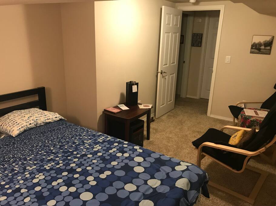 Queen bed in a spacious room
