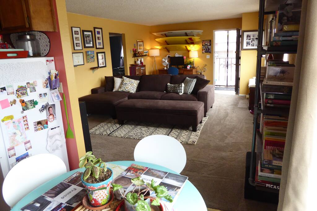 The living and dining areas are bright thanks to a wall of windows. At night, you can open them up and hear the sea lions from the harbor (1 block away).